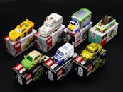 Vibrant display of die-cast toy cars from popular franchises like Star Wars and Disney.